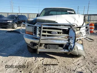1999 Ford Super Duty F-250 XL with VIN 1FTNW21F6XEC74075, listed as a Copart auction lot 52581155 with 118,630 mi miles and Salvage Title. Bid and sale history available at carsss.com. Image 11.
