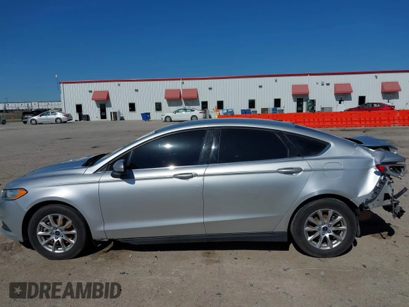 2016 Ford Fusion S z VIN 3FA6P0G75GR105206, wystawiony jako IAAI lot #42032773 z przebiegiem 174 927 mil mil oraz . Historia ofert i sprzedaży dostępna na DreamBid. Obrazek 14.