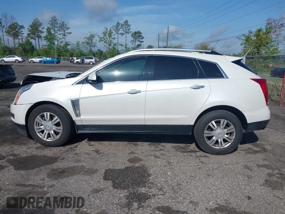 2013 Cadillac SRX Luxury Collection with VIN 3GYFNCE33DS608040, listed as a IAAI auction lot 41912860 with 128,295 mi miles and . Bid and sale history available at DreamBid. Image 14.