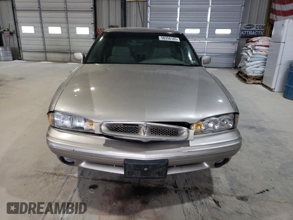1998 Pontiac Bonneville SE z VIN 1G2HX52K6WH213866, wystawiony jako Copart lot #58358105 z przebiegiem 180 993 mil mil oraz Szkoda całkowita • Salvage title. Historia ofert i sprzedaży dostępna na DreamBid. Obrazek 5.