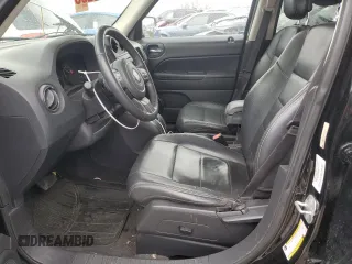 2014 Jeep Patriot High Altitude with VIN 1C4NJPFAXED786160, listed as a Copart auction lot 46140685 with 94,688 mi miles and Salvage Title. Bid and sale history available at DreamBid. Image 7.
