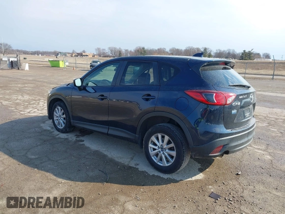 2015 Mazda CX-5 Touring with VIN JM3KE2CY0F0516589, listed as a IAAI auction lot 41707973 with 109,245 mi miles. Bid and sale history available at carsss.com. Image 3.