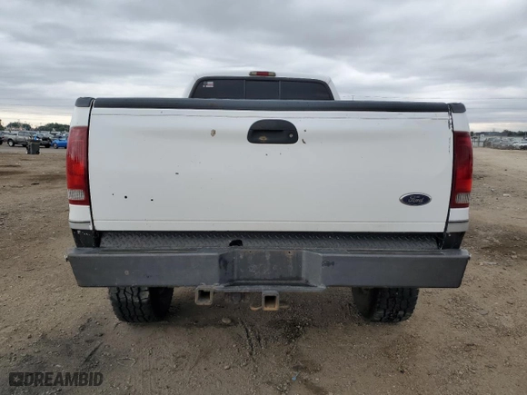 1999 Ford Super Duty F-350 SRW XL with VIN 1FTSX31F2XEF07231, listed as a Copart auction lot 71832414 with 286,130 mi miles and Salvage Title. Bid and sale history available at carsss.com. Image 6.