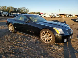 2006 Cadillac XLR z VIN 1G6YX36D965602114, wystawiony jako Copart lot #80151794 z przebiegiem Nie podano mil oraz Szkody całkowita. Historia ofert i sprzedaży dostępna na DreamBid. Obrazek 4.