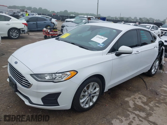 2020 Ford Fusion SE with VIN 3FA6P0LU2LR266943, listed as a IAAI auction lot 42160987 with 61,435 mi miles and . Bid and sale history available at DreamBid. Image 2.