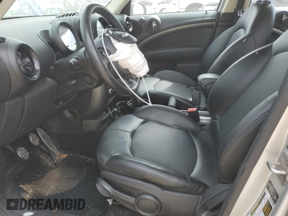 2014 MINI Countryman S with VIN WMWZC5C55EWM18087, listed as a Copart auction lot 68661614 with Not provided miles and Salvage title. Bid and sale history available at DreamBid. Image 7.