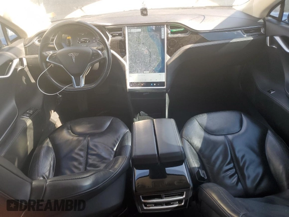 2014 Tesla Model S 60 z VIN 5YJSA1H13EFP52938, wystawiony jako Copart lot #56050055 z przebiegiem 125 376 mil mil oraz Czysty tytuł • Clean title. Historia ofert i sprzedaży dostępna na DreamBid. Obrazek 8.