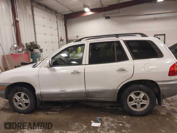 2003 Hyundai Santa Fe GLS with VIN KM8SC13E83U533400, listed as a IAAI auction lot 41610045 with 98,196 mi miles. Bid and sale history available at carsss.com. Image 14.