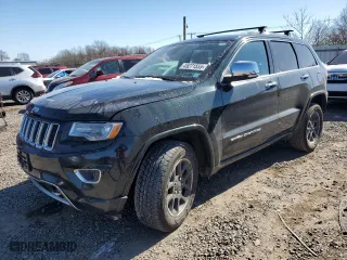 2014 Jeep Grand Cherokee Overland with VIN 1C4RJFCT8EC409673, listed as a Copart auction lot 45271555 with 136,810 mi miles and Salvage Title. Bid and sale history available at carsss.com. Image 1.