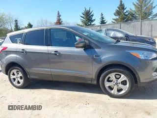 2014 Ford Escape SE with VIN 1FMCU9G99EUB13371, listed as a IAAI auction lot 42167417 with 140,145 mi miles and . Bid and sale history available at DreamBid. Image 13.