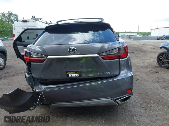 2022 Lexus RX 350 z VIN 2T2HZMDA8NC313731, wystawiony jako IAAI lot #42190259 z przebiegiem 144 177 mil mil oraz . Historia ofert i sprzedaży dostępna na DreamBid. Obrazek 16.