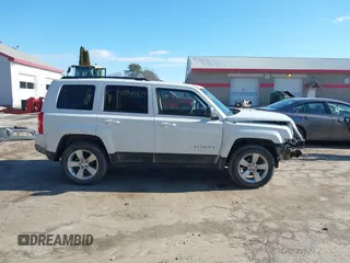 2016 Jeep Patriot High Altitude with VIN 1C4NJRFB9GD595997, listed as a IAAI auction lot 41741180 with 136,115 mi miles and . Bid and sale history available at DreamBid. Image 14.
