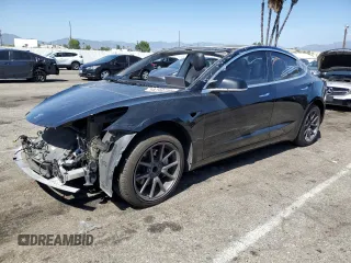 2019 Tesla Model 3 Mid Range z VIN 5YJ3E1EA8KF306096, wystawiony jako Copart lot #54790755 z przebiegiem 170 775 mil mil oraz Szkody całkowita. Historia ofert i sprzedaży dostępna na DreamBid. Obrazek 1.
