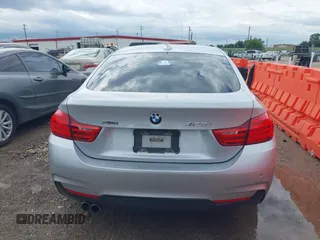 2015 BMW 4 Series 428i xDrive with VIN WBA4C9C50FD330482, listed as a IAAI auction lot 42116547 with 192,739 mi miles and . Bid and sale history available at DreamBid. Image 16.