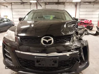 2011 Mazda CX-7 i Sport z VIN JM3ER2B54B0355683, wystawiony jako IAAI lot #42153260 z przebiegiem 238 786 mil mil oraz . Historia ofert i sprzedaży dostępna na DreamBid. Obrazek 6.