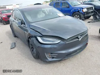 2018 Tesla Model X 75D with VIN 5YJXCDE21JF139712, listed as a IAAI auction lot 41905326 with NaN miles. Bid and sale history available at carsss.com. Image 1.