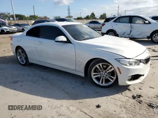2016 BMW 4 Series 428i with VIN WBA3V7C57G5A27594, listed as a Copart auction lot 87968815 with 55,058 mi miles and Salvage title. Bid and sale history available at DreamBid. Image 4.