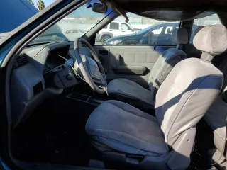 1991 Plymouth Sundance z VIN 1P3XP24D6MN564571, wystawiony jako Copart lot #78415044 z przebiegiem 50 625 mil mil oraz Tytuł czysty. Historia ofert i sprzedaży dostępna na DreamBid. Obrazek 7.