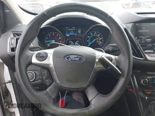 2015 Ford Escape Titanium with VIN 1FMCU0J99FUB92563, listed as a IAAI auction lot 42649556 with 183,199 mi miles and . Bid and sale history available at DreamBid. Image 11.
