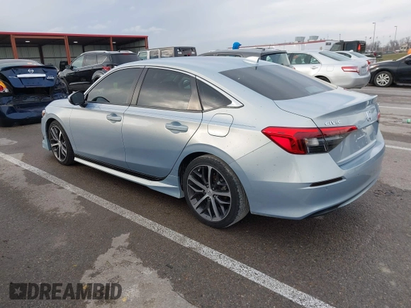 2022 Honda Civic Sedan Touring with VIN 2HGFE1F99NH306559, listed as a IAAI auction lot 41208480 with 18,956 mi miles. Bid and sale history available at carsss.com. Image 3.
