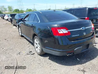 2011 Ford Taurus SEL with VIN 1FAHP2EW6BG127102, listed as a IAAI auction lot 42131123 with 168,965 mi miles. Bid and sale history available at carsss.com. Image 3.
