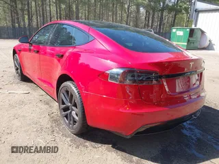 2021 Tesla Model S Long Range z VIN 5YJSA1E51MF436329, wystawiony jako IAAI lot #41918018 z przebiegiem 44 029 mil mil oraz . Historia ofert i sprzedaży dostępna na DreamBid. Obrazek 3.