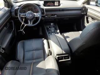 2023 Mazda CX-50 Premium Plus with VIN 7MMVABEY1PN125180, listed as a Copart auction lot 52075375 with 32,483 mi miles and Salvage Title. Bid and sale history available at DreamBid. Image 8.