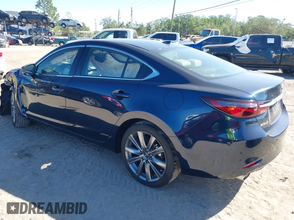 2021 Mazda 6 Grand Touring with VIN JM1GL1TY3M1619771, listed as a IAAI auction lot 40964809 with 25,816 mi miles and . Bid and sale history available at DreamBid. Image 3.