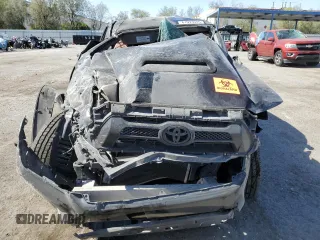 2014 Toyota Tacoma PreRunner with VIN 3TMJU4GN0EM170736, listed as a Copart auction lot 61993545 with 194,801 mi miles and Salvage title. Bid and sale history available at DreamBid. Image 5.