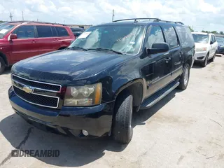2007 Chevrolet Suburban LT with VIN 3GNFC16057G132960, listed as a IAAI auction lot 42565959 with 144,332 mi miles and . Bid and sale history available at DreamBid. Image 2.