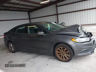 2017 Ford Fusion SE z VIN 3FA6P0HD2HR270782, wystawiony jako IAAI lot #42310190 z przebiegiem 107 133 mil mil oraz . Historia ofert i sprzedaży dostępna na DreamBid. Obrazek 13.