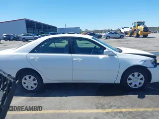 2006 Toyota Camry STD with VIN 4T1BE32KX6U734944, listed as a IAAI auction lot 41745226 with 243,967 mi miles. Bid and sale history available at carsss.com. Image 13.