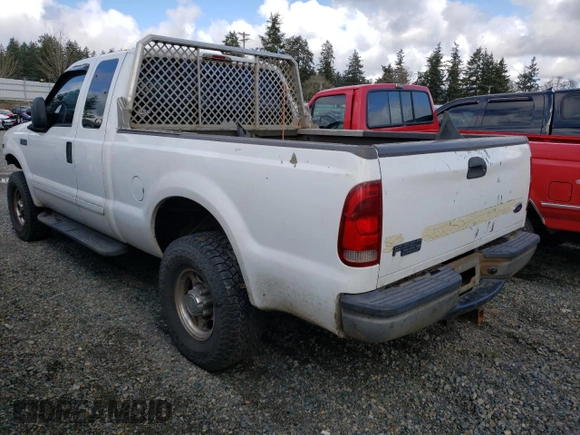 2002 Ford Super Duty F-250 XL with VIN 1FTNX21SX2EB43928, listed as a Copart auction lot 88308645 with 218,584 mi miles and Salvage Title. Bid and sale history available at carsss.com. Image 2.