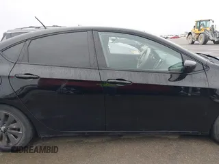 2014 Dodge Dart Aero with VIN 1C3CDFDH2ED854769, listed as a IAAI auction lot 41699609 with 213,815 mi miles and . Bid and sale history available at carsss.com. Image 14.