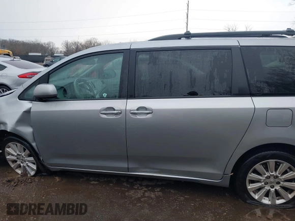 2013 Toyota Sienna XLE with VIN 5TDDK3DC5DS070243, listed as a IAAI auction lot 41162661 with 149,672 mi miles and . Bid and sale history available at DreamBid. Image 14.