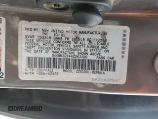 2004 Toyota Corolla CE with VIN 1NXBR32E44Z263126, listed as a Copart auction lot 50839945 with 204,086 mi miles and Salvage Title. Bid and sale history available at DreamBid. Image 12.