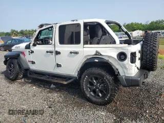 2021 Jeep Wrangler Unlimited 80th Anniversary z VIN 1C4HJXDG4MW794519, wystawiony jako Copart lot #60116105 z przebiegiem 25 708 mil mil oraz Szkoda całkowita • Salvage title. Historia ofert i sprzedaży dostępna na DreamBid. Obrazek 2.