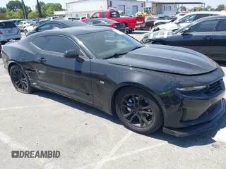 2020 Chevrolet Camaro 1LT with VIN 1G1FB1RX7L0126931, listed as a IAAI auction lot 42343201 with 51,727 mi miles and . Bid and sale history available at DreamBid. Image 1.