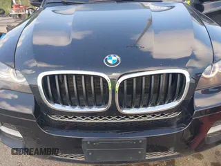 2014 BMW X6 xDrive35i with VIN 5UXFG2C5XE0C43526, listed as a IAAI auction lot 42121122 with 199,564 mi miles. Bid and sale history available at carsss.com. Image 6.