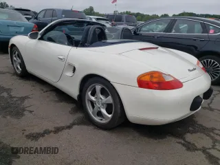 2001 Porsche Boxster z VIN WP0CA29821U622592, wystawiony jako Copart lot #56050735 z przebiegiem Nie podano mil oraz Szkoda całkowita • Salvage title. Historia ofert i sprzedaży dostępna na DreamBid. Obrazek 2.