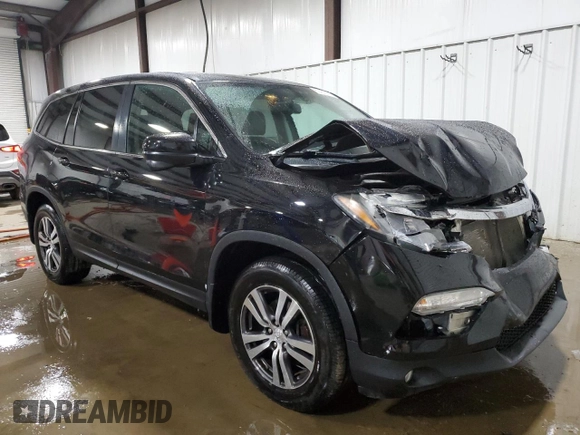 2017 Honda Pilot EX-L with VIN 5FNYF6H55HB096659, listed as a Copart auction lot 60426095 with 144,047 mi miles and Salvage title. Bid and sale history available at DreamBid. Image 4.