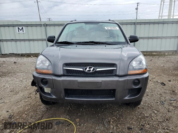 2009 Hyundai Tucson GLS with VIN KM8JM12B79U042597, listed as a Copart auction lot 52164465 with 90,943 mi miles and Salvage Title. Bid and sale history available at carsss.com. Image 5.
