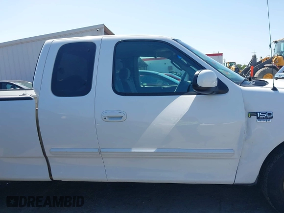 2003 Ford F-150 with VIN 1FTRX17W83KB15716, listed as a IAAI auction lot 42136249 with 169,560 mi miles and . Bid and sale history available at DreamBid. Image 14.