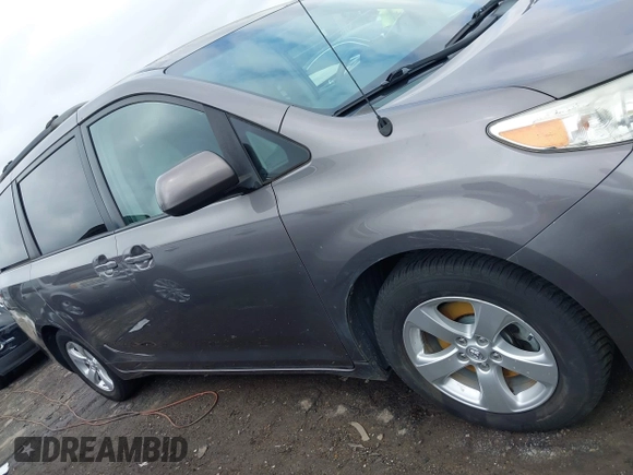 2014 Toyota Sienna LE AAS with VIN 5TDKK3DC3ES506466, listed as a IAAI auction lot 41908023 with 118,297 mi miles and . Bid and sale history available at carsss.com. Image 13.