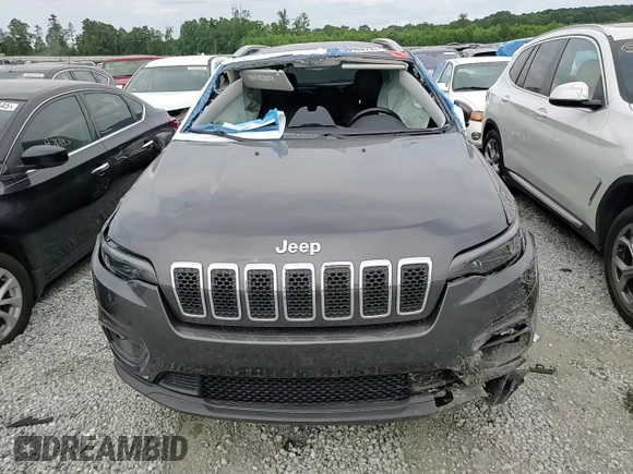 2019 Jeep Cherokee Latitude Plus with VIN 1C4PJLLN0KD119876, listed as a Copart auction lot 60462765 with 61,909 mi miles and Salvage title. Bid and sale history available at DreamBid. Image 13.