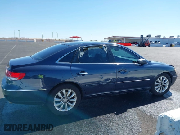 2007 Hyundai Azera SE z VIN KMHFC46F77A153141, wystawiony jako IAAI lot #41731777 z przebiegiem Nie podano mil oraz . Historia ofert i sprzedaży dostępna na DreamBid. Obrazek 13.