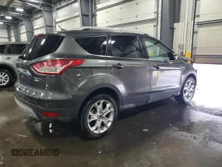 2015 Ford Escape Titanium with VIN 1FMCU9J90FUA26808, listed as a Copart auction lot 54449805 with 184,576 mi miles and Salvage title. Bid and sale history available at DreamBid. Image 3.
