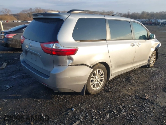 2016 Toyota Sienna XLE with VIN 5TDYK3DC2GS720782, listed as a IAAI auction lot 41184141 with 146,656 mi miles. Bid and sale history available at carsss.com. Image 4.