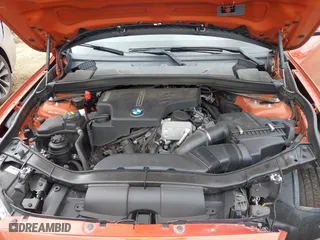 2015 BMW X1 xDrive28i with VIN WBAVL1C50FVY41206, listed as a IAAI auction lot 41508136 with 102,725 mi miles. Bid and sale history available at carsss.com. Image 10.