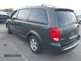 2012 Dodge Grand Caravan SXT with VIN 2C4RDGCG1CR141019, listed as a IAAI auction lot 42088541 with 148,931 mi miles and . Bid and sale history available at DreamBid. Image 3.